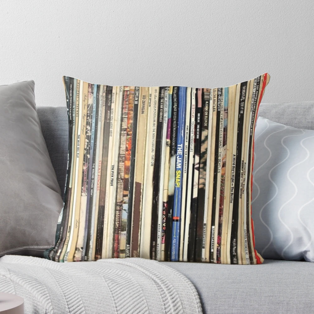 Cozy classic rock-themed pillow featuring a collage of vintage vinyl records and album art
