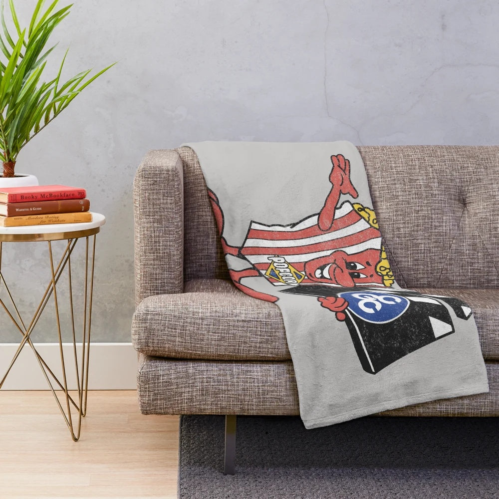 Vintage-inspired distressed cinema plush blanket with retro movie theater graphics