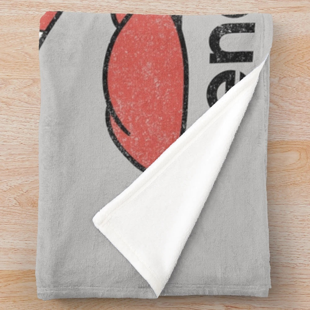 Vintage-inspired distressed cinema plush blanket with retro movie theater graphics