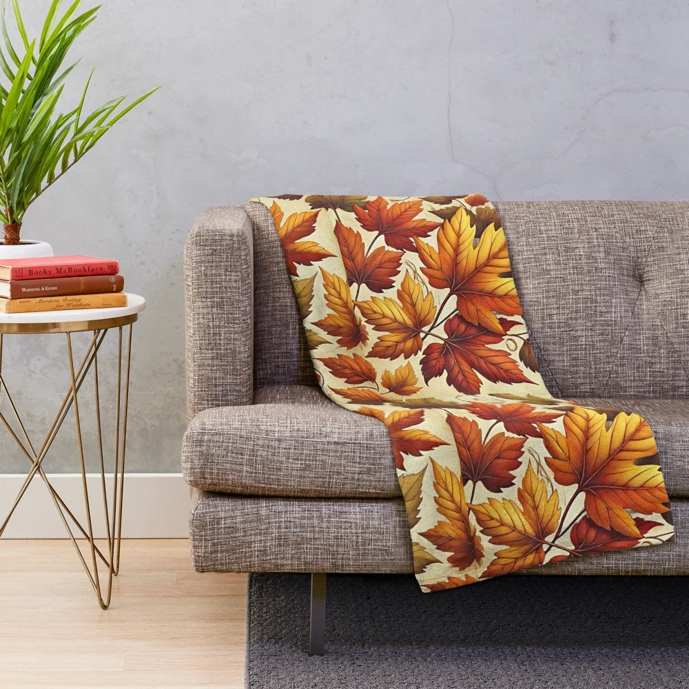Vintage-inspired plush blanket featuring a detailed, realistic fall leaves design