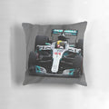 Vintage-style digital art illustration of a Formula 1 racing car on a decorative throw pillow