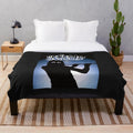 Genesis-themed plush blanket featuring the iconic band members