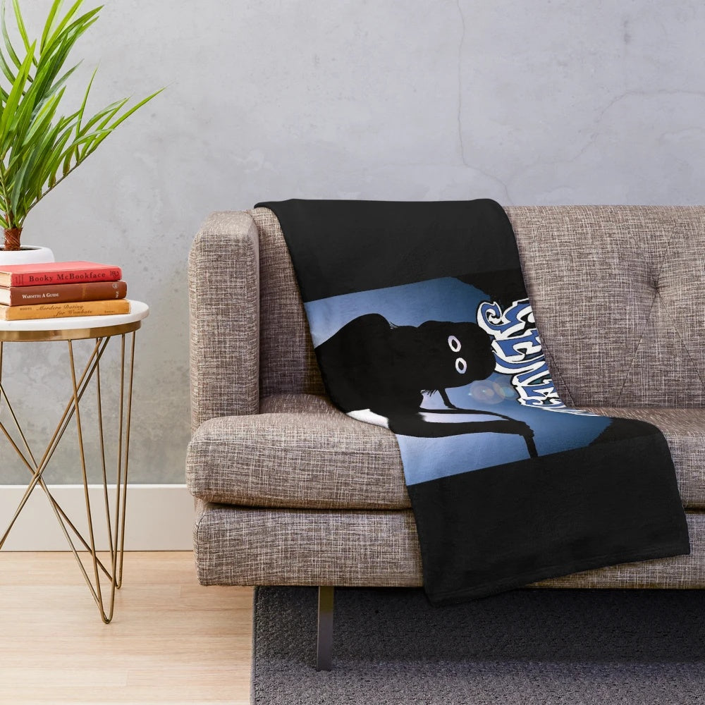Genesis-themed plush blanket featuring the iconic band members
