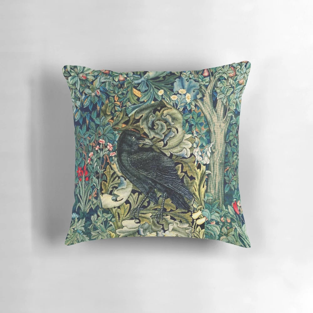 Vintage-style green floral pillow with a raven perched on acanthus leaves, creating a nature-inspired, elegant design.