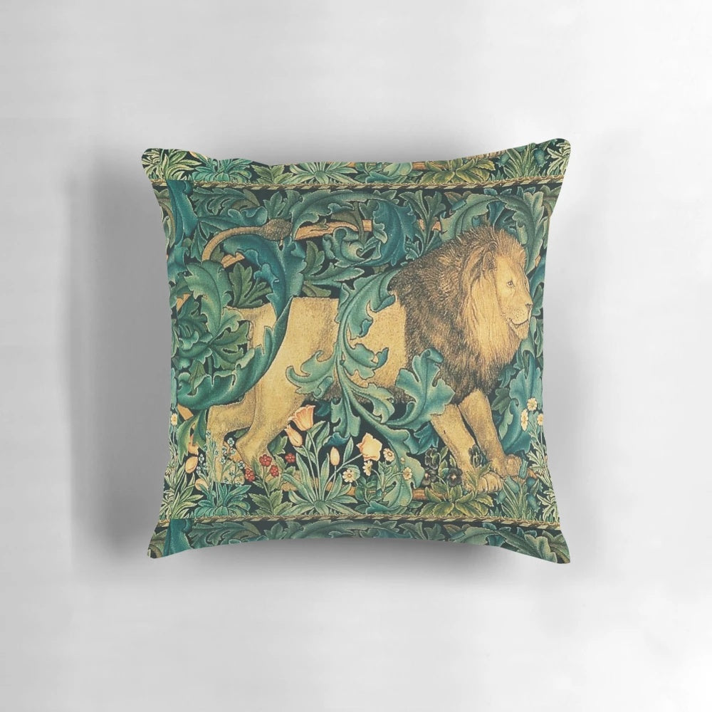 Vintage-inspired green pillow featuring a forest animal design, including a lion, on an antique-style tapestry background.