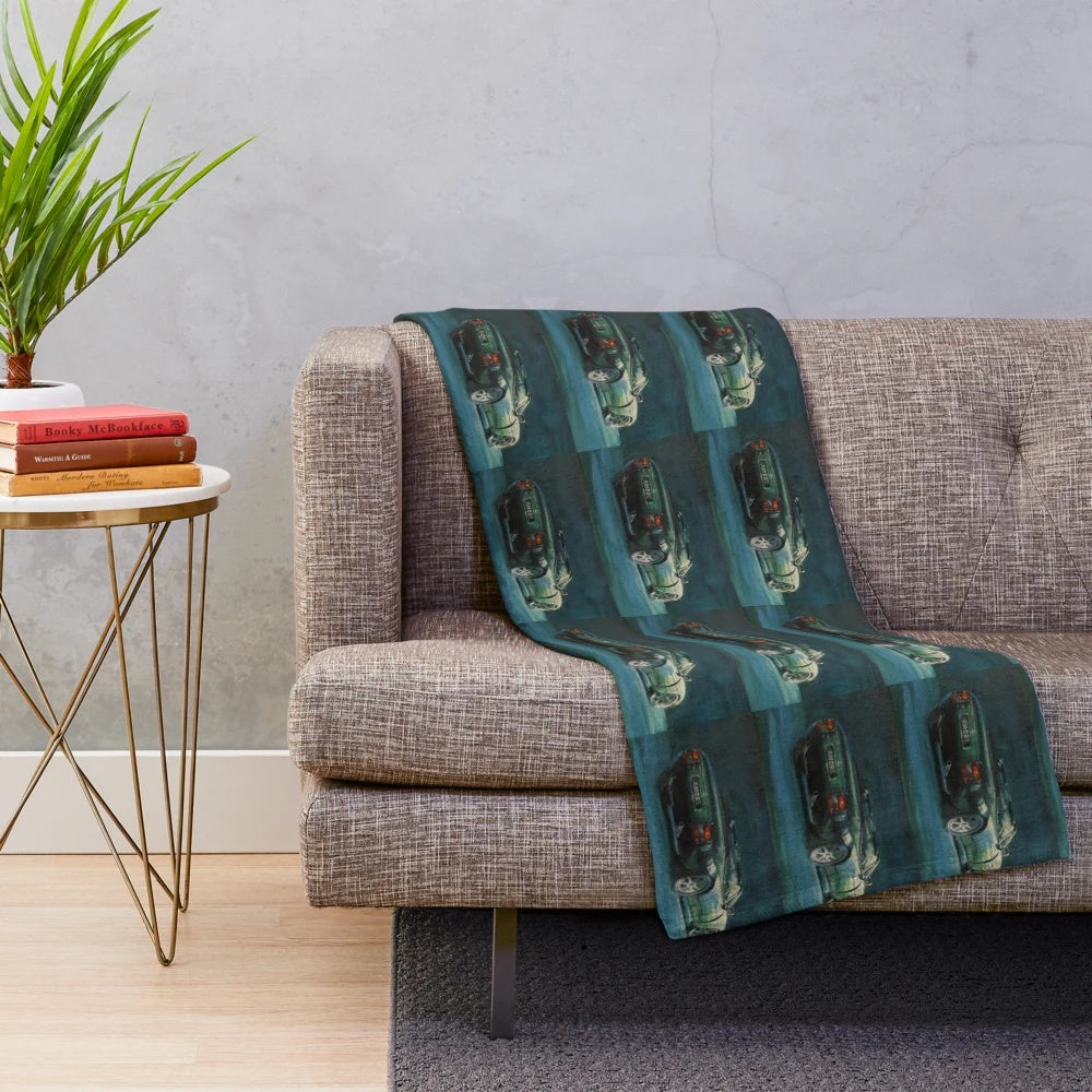 Green plush blanket with a classic TVR Griffith sports car design