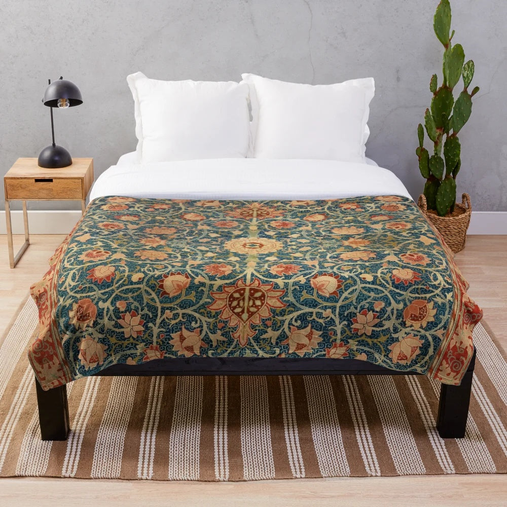 Vintage-inspired plush blanket featuring a William Morris-style floral carpet print in teal and red