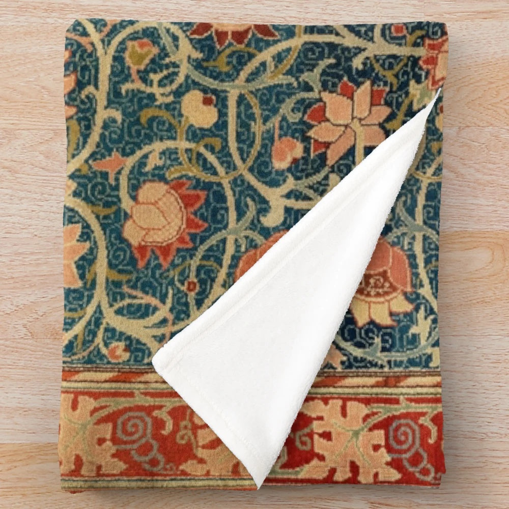 Vintage-inspired plush blanket featuring a William Morris-style floral carpet print in teal and red