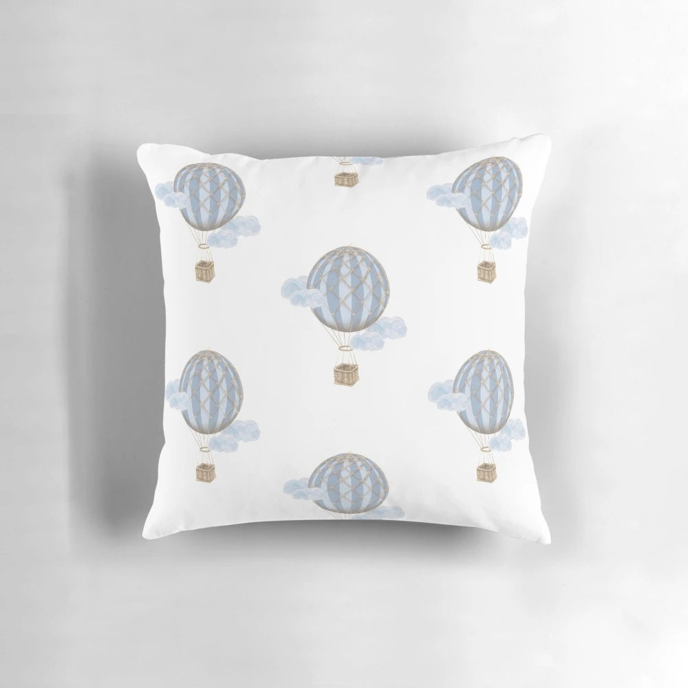 Vintage-style blue and white hot air balloon decorative throw pillow for a child's bedroom or nursery