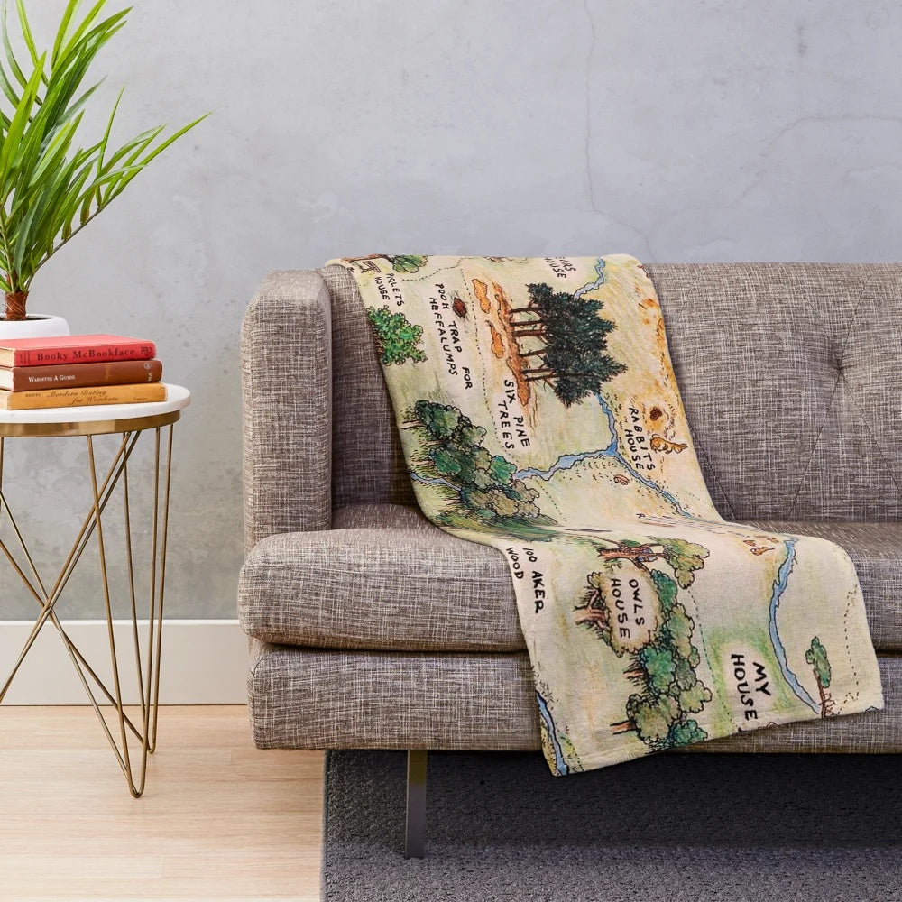 Vintage-inspired Hundred Acre Wood map plush blanket featuring Winnie the Pooh inspired artwork