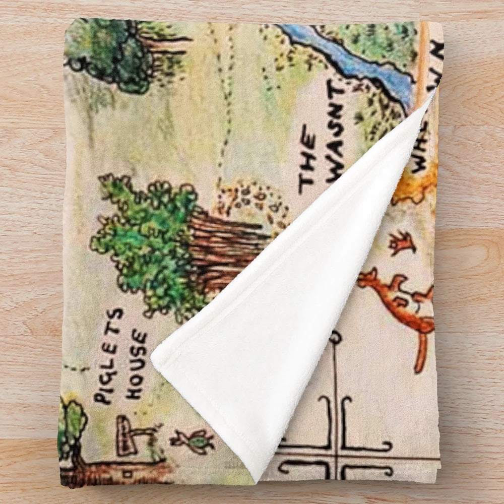 Vintage-inspired Hundred Acre Wood map plush blanket featuring Winnie the Pooh inspired artwork