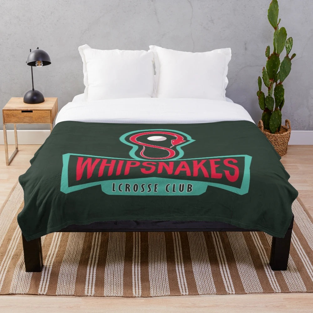 Vintage-inspired lacrosse plush blanket with a team symbol and sports design