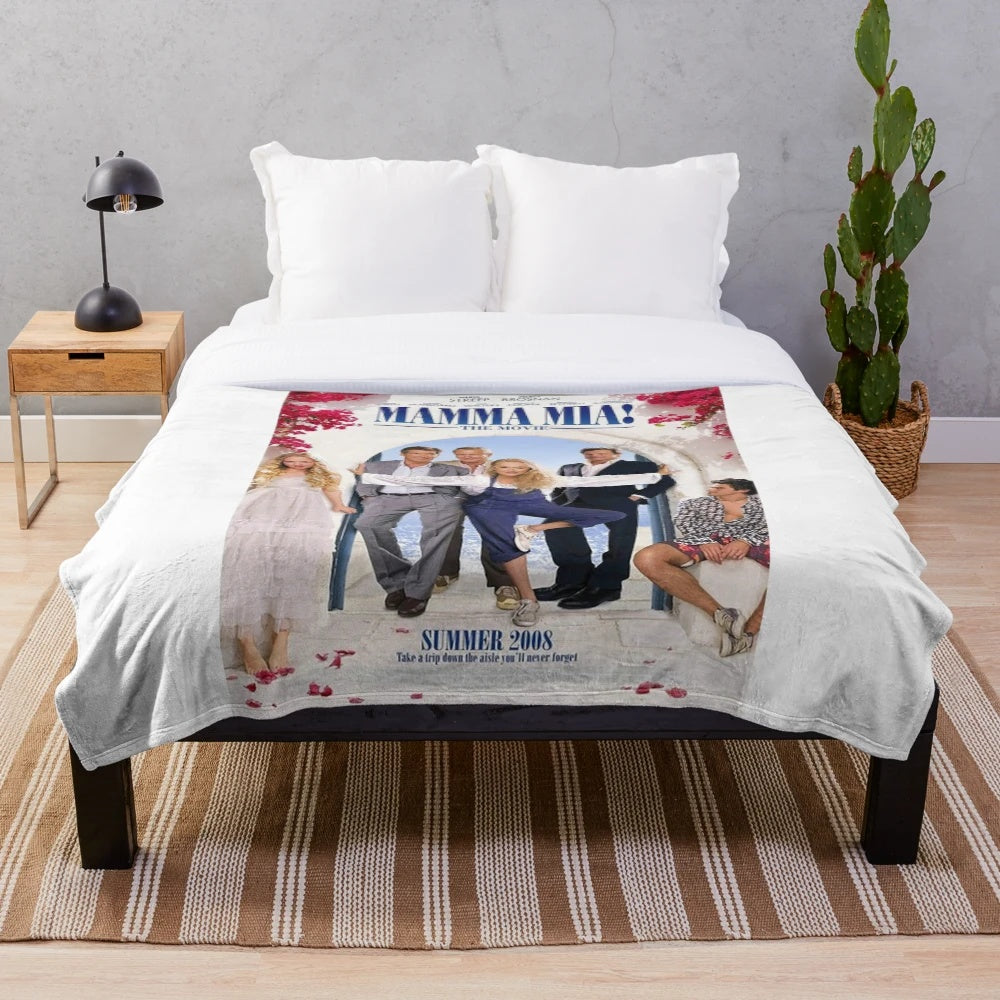 Vintage-style plush blanket featuring Mamma Mia movie characters and music