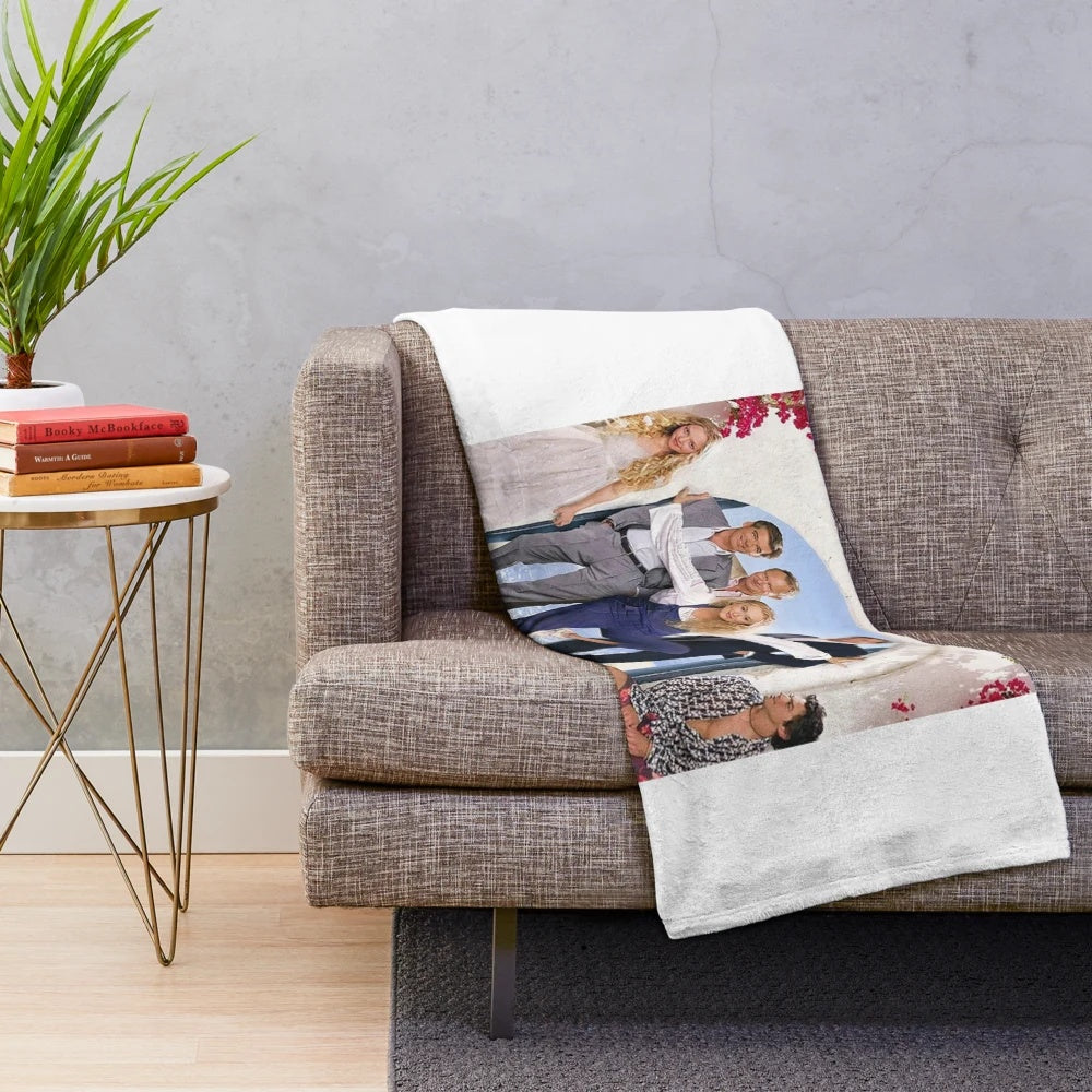 Vintage-style plush blanket featuring Mamma Mia movie characters and music