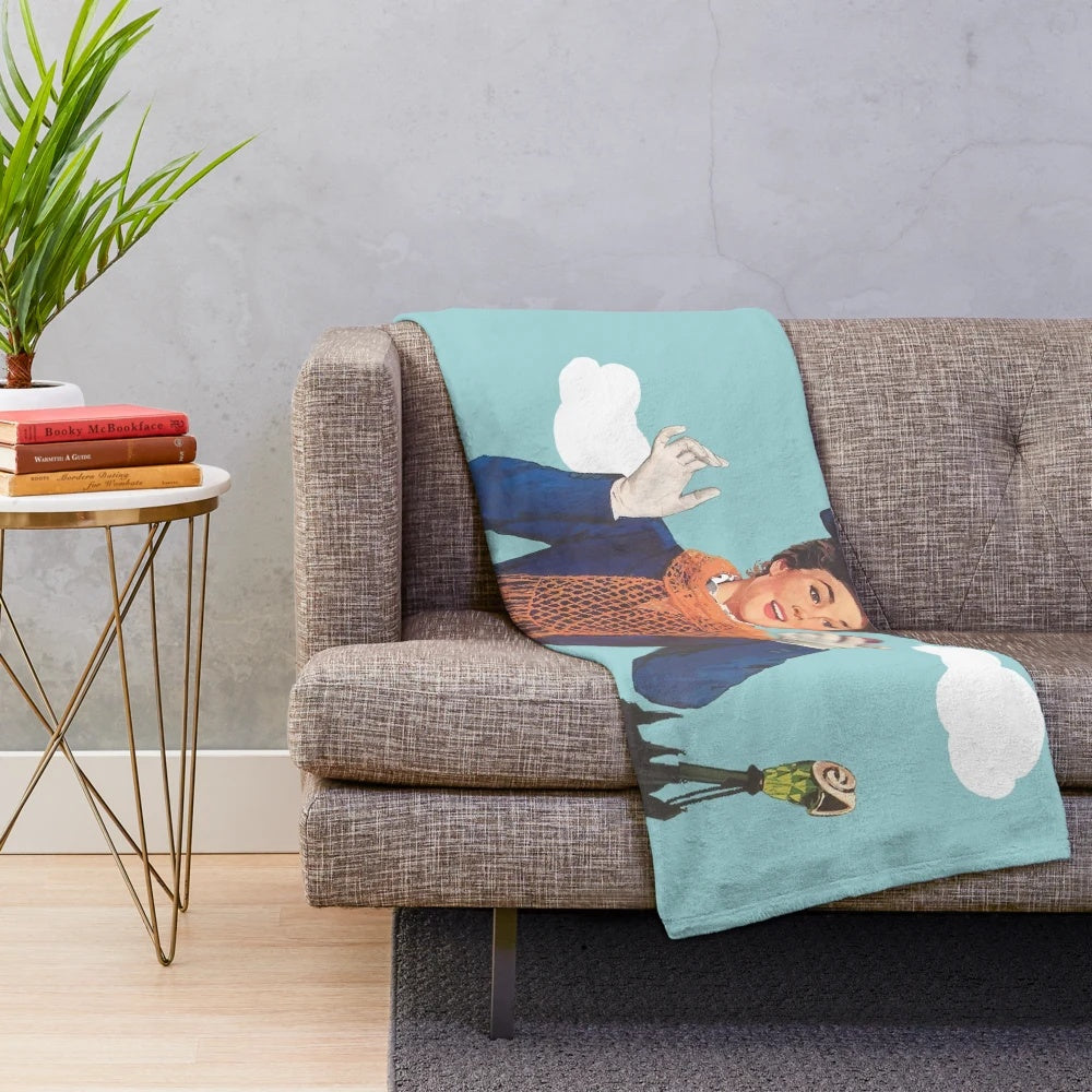 Vintage-inspired Mary Poppins plush blanket featuring the iconic parrot umbrella and Julie Andrews