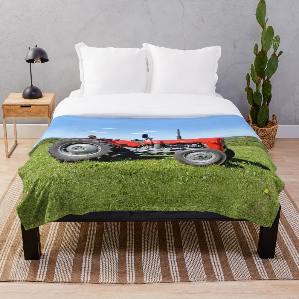 Vintage-inspired plush blanket featuring a Massey Ferguson 35 tractor design