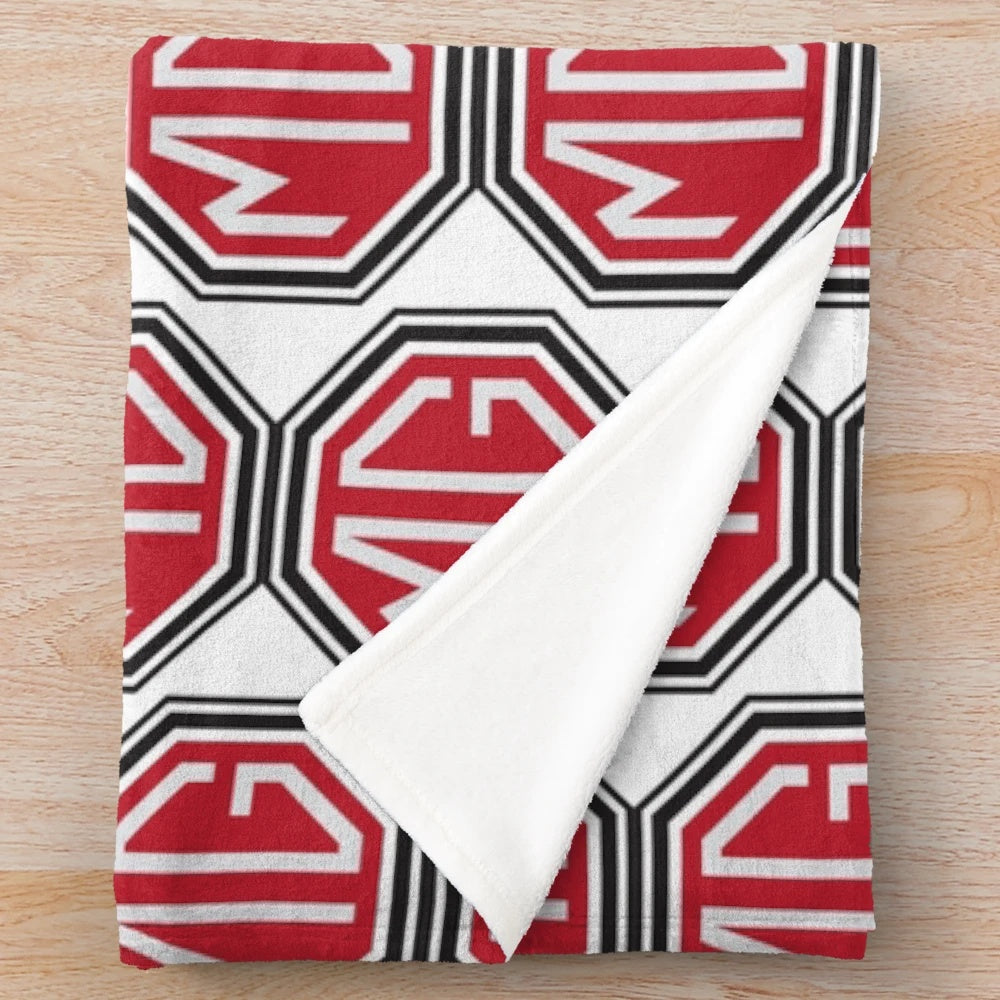 Vintage-inspired MG logo plush blanket for classic car enthusiasts
