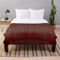 Vintage-inspired Moroccan plush blanket with traditional artwork