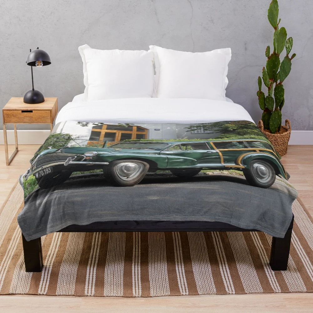 Cozy plush blanket featuring the iconic Morris Minor 1000 Traveller estate wagon