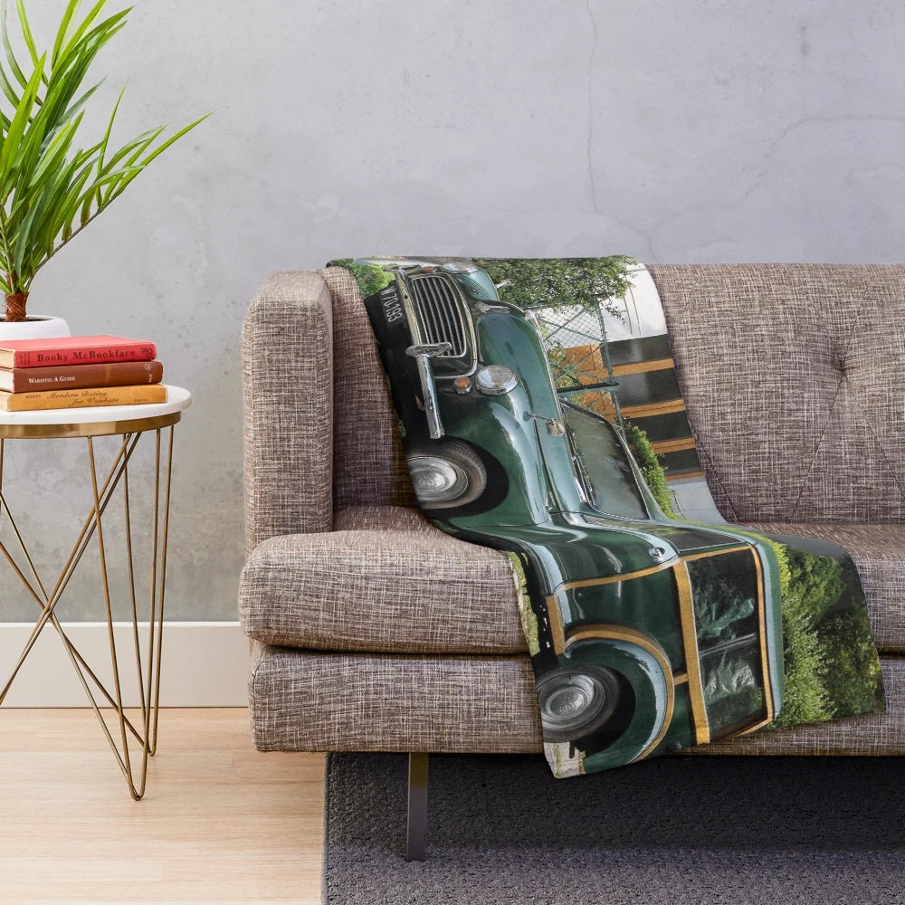 Cozy plush blanket featuring the iconic Morris Minor 1000 Traveller estate wagon