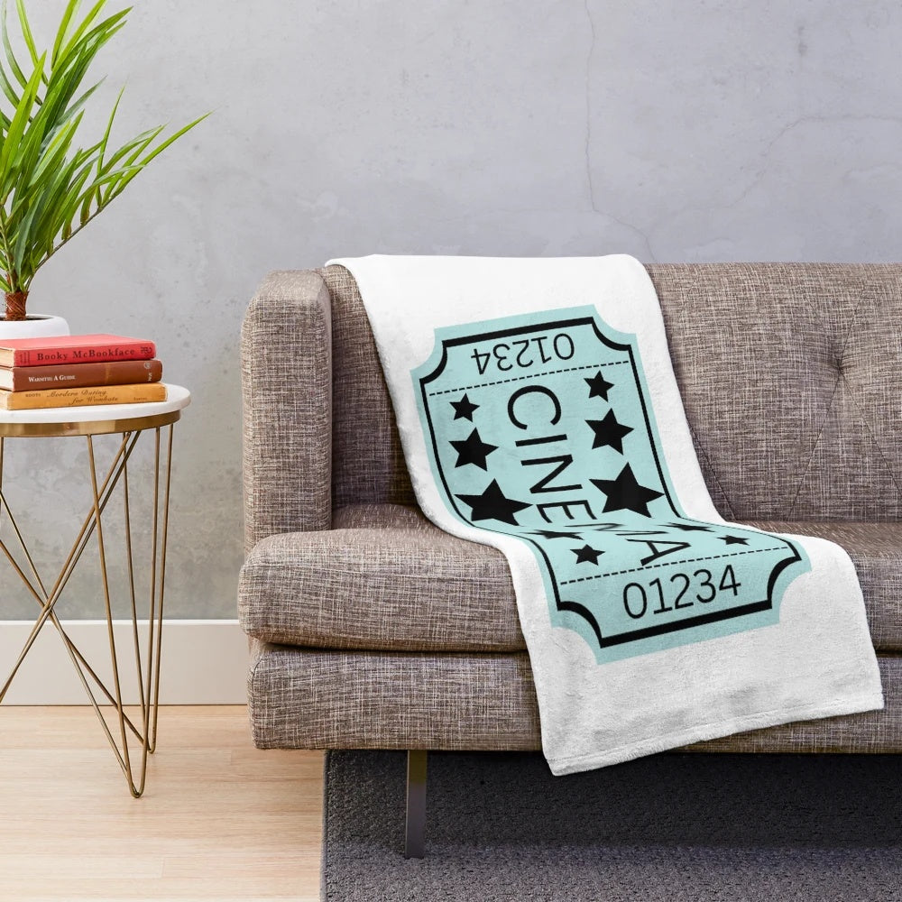 Vintage movie ticket-themed plush blanket