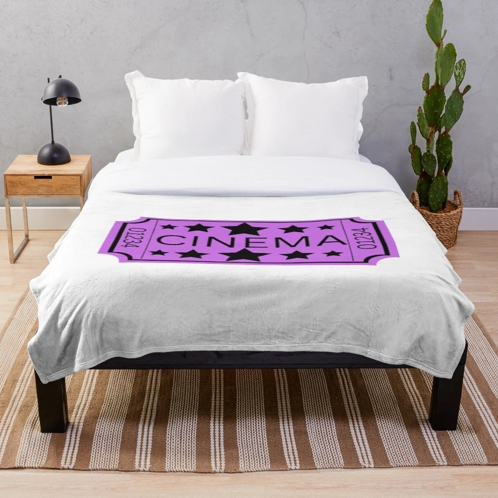Vintage-inspired movie ticket plush blanket