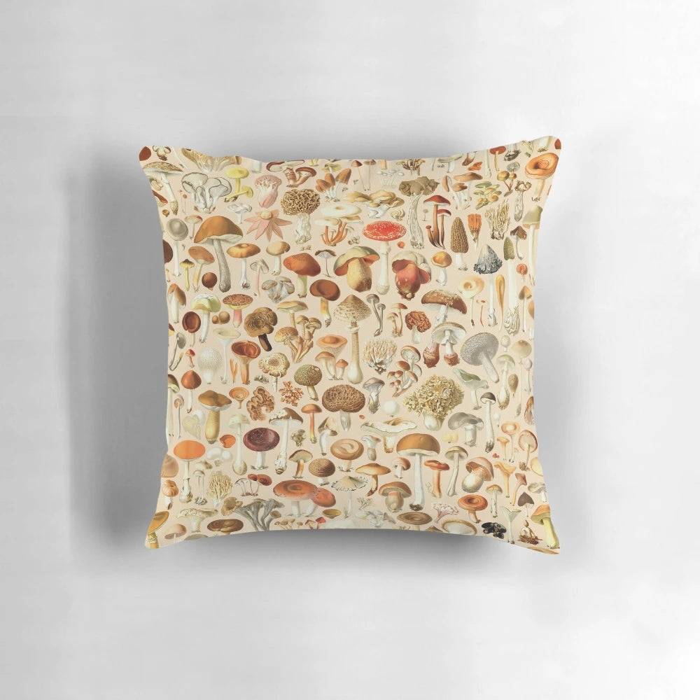 Vintage-inspired decorative pillow featuring a collection of mushroom designs in autumnal colors