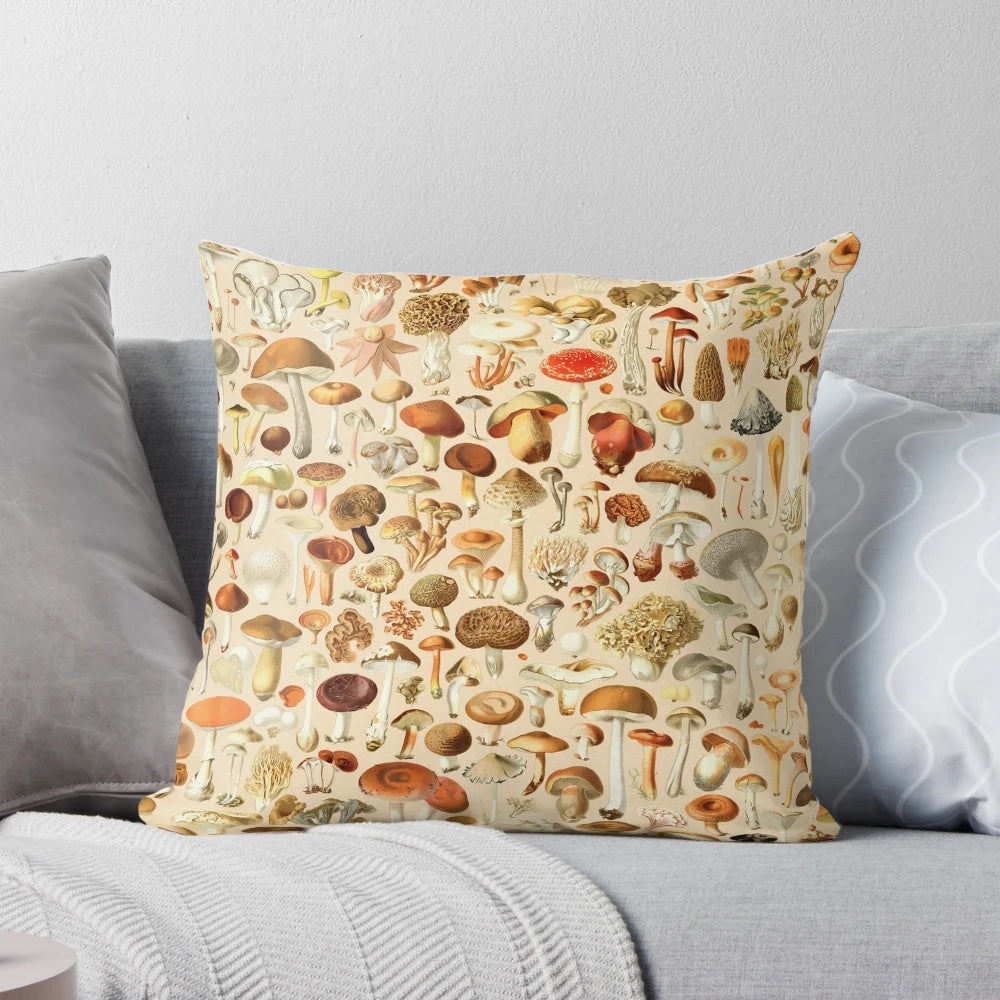 Vintage-inspired decorative pillow featuring a collection of mushroom designs in autumnal colors