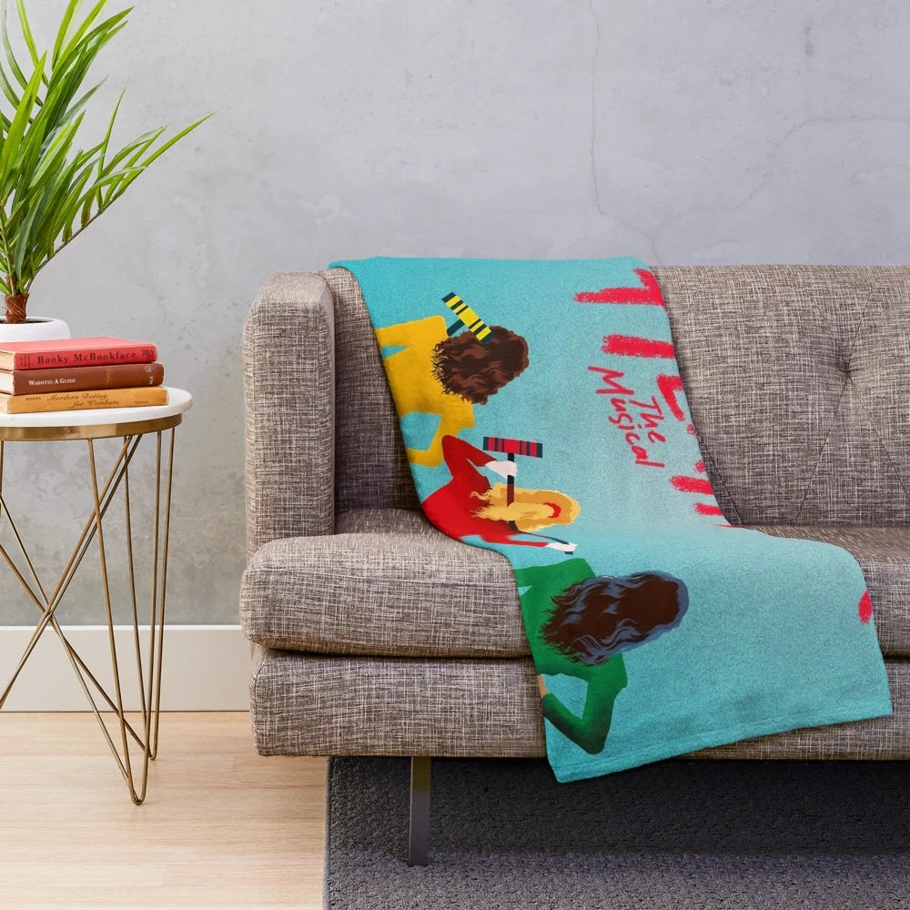 Vintage-inspired musical plush blanket featuring The Musical West End design