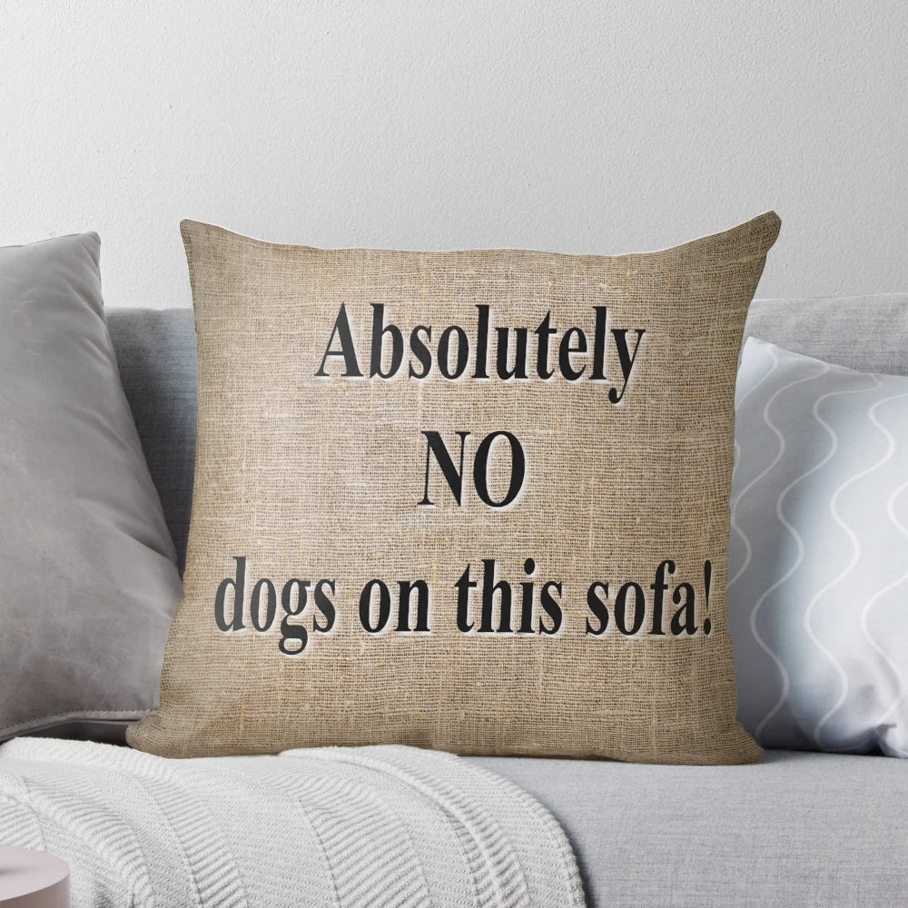 Vintage-inspired 'No Dogs on Sofa' throw pillow with retro text and natural textiles