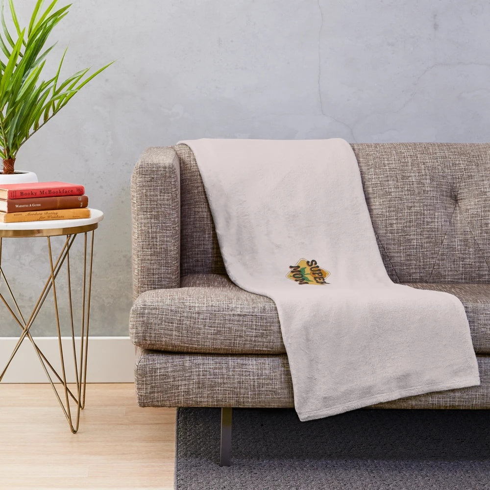 Vintage-inspired orange and groovy plush blanket, perfect for Mother's Day