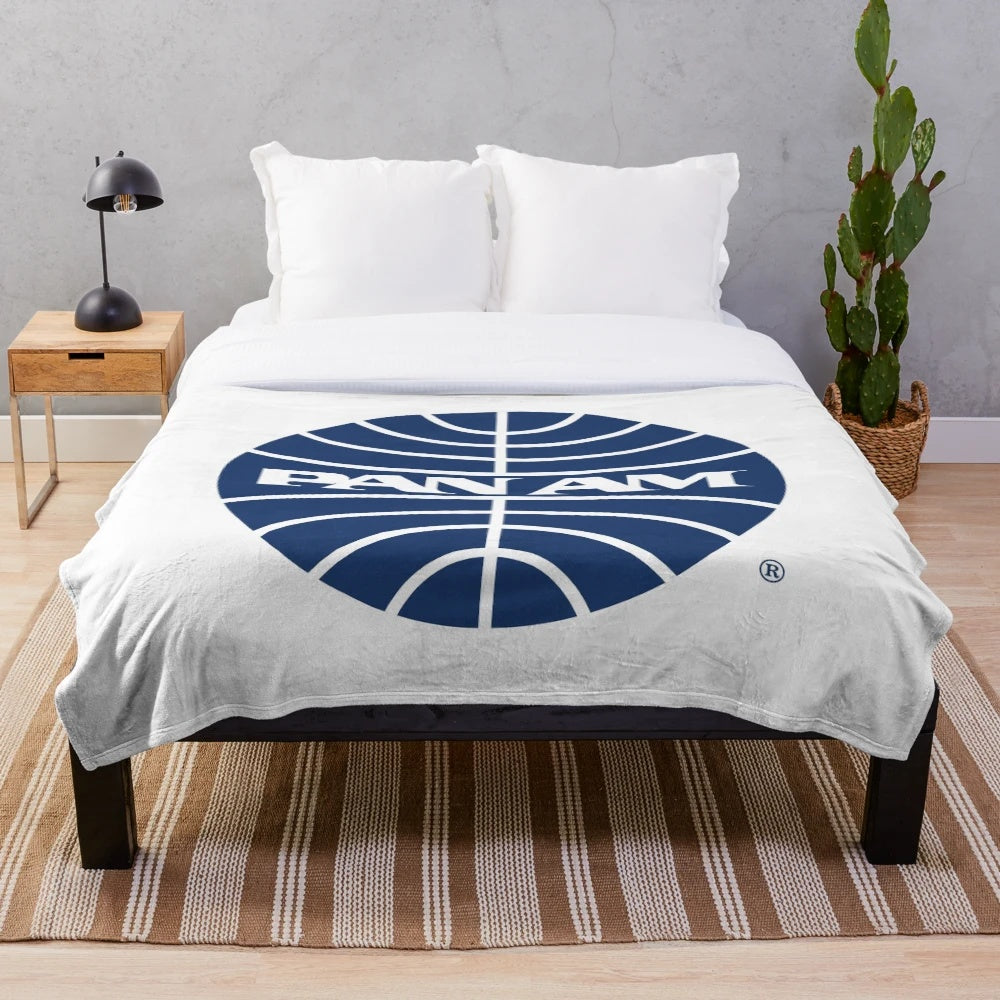 Plush blanket with vintage Pan Am airline logo design