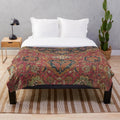 Colorful distressed plush blanket with 16th century inspired Persian medallion pattern