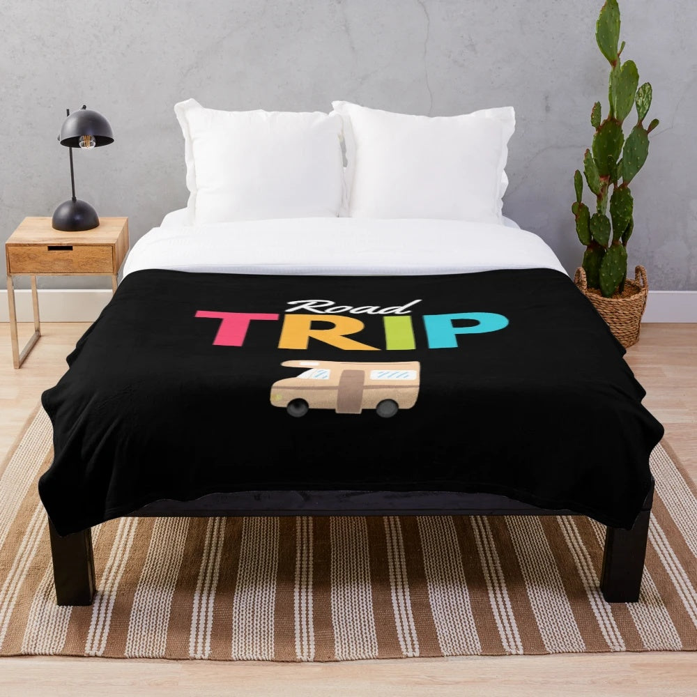 Vintage-inspired plush blanket featuring a retro travel theme