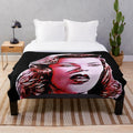 Soft and cozy vintage-inspired plush blanket with a classic cinema character design