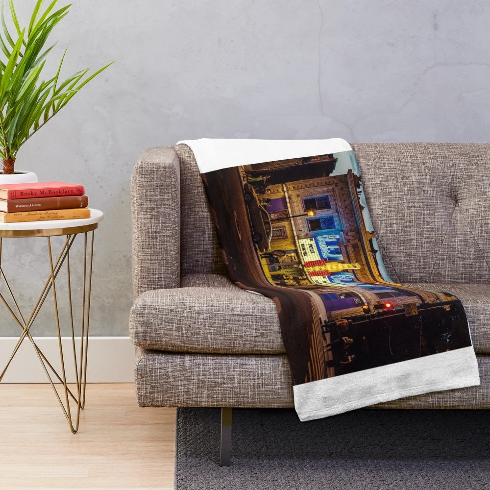 Retro plush blanket featuring classic cinema motifs