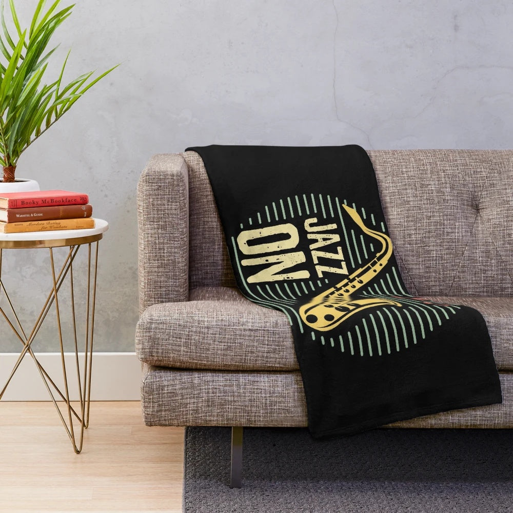 Plush blanket featuring a vintage-style illustration of a saxophone player