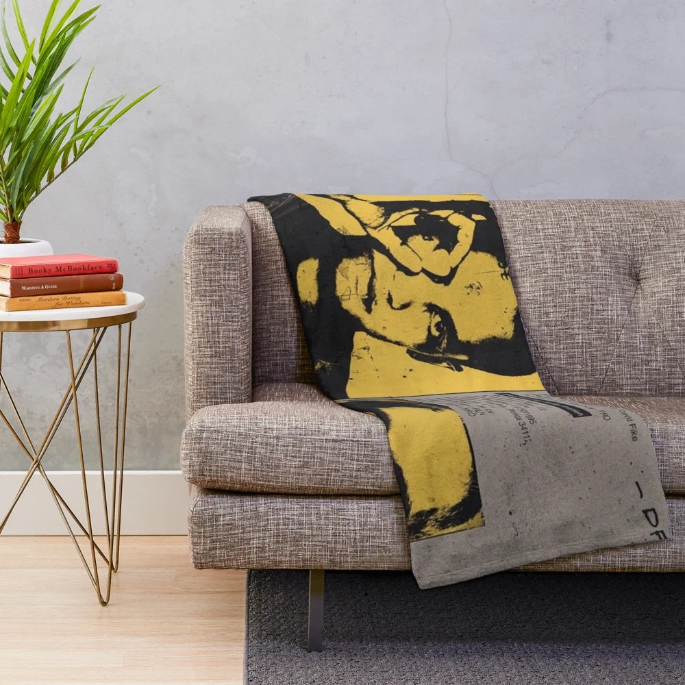 Vintage-inspired plush blanket with grunge music album cover design