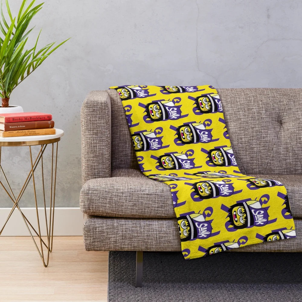 Vintage-inspired plush blanket with abstract nature-themed pattern