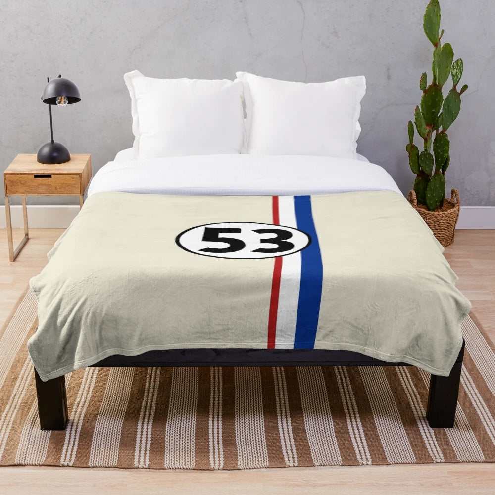 Vintage-inspired plush blanket featuring a classic car design