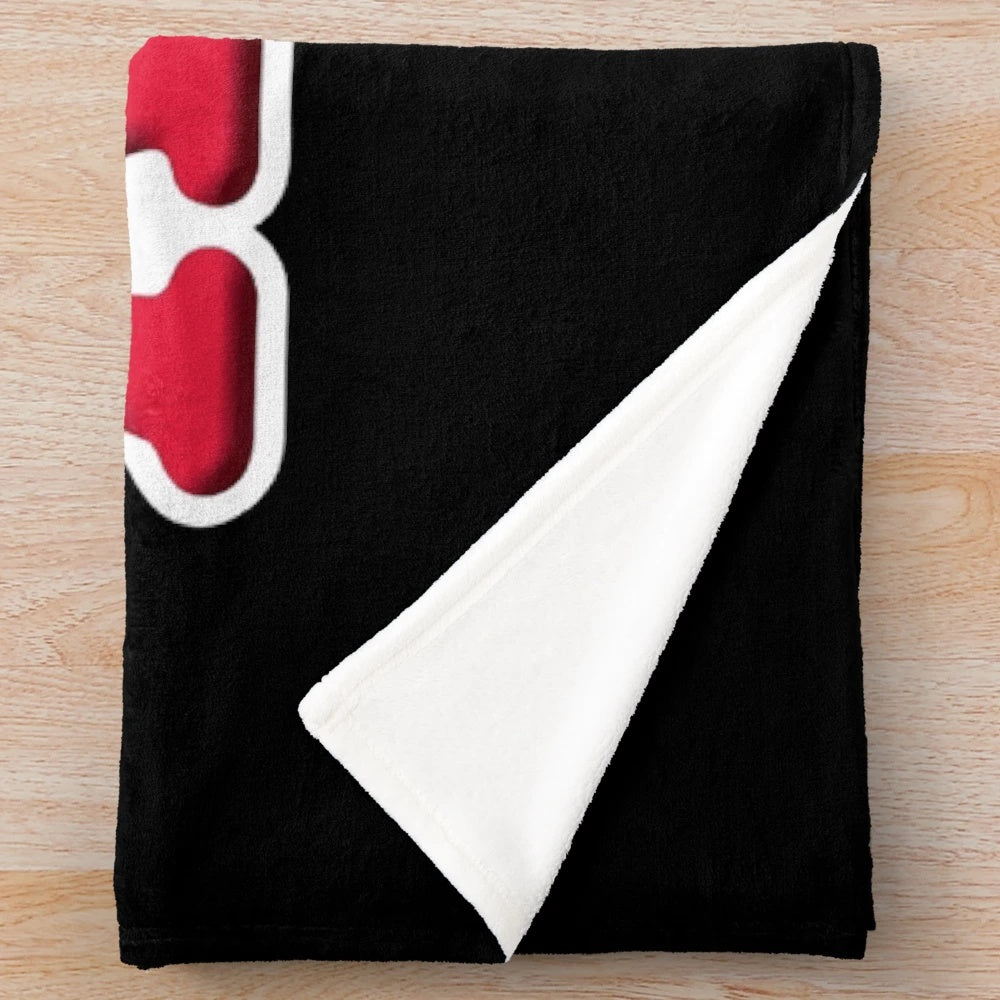 Vintage-inspired plush blanket featuring the iconic Annie musical logo