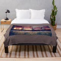 Vintage-inspired plush blanket featuring a design of antique cinema chairs