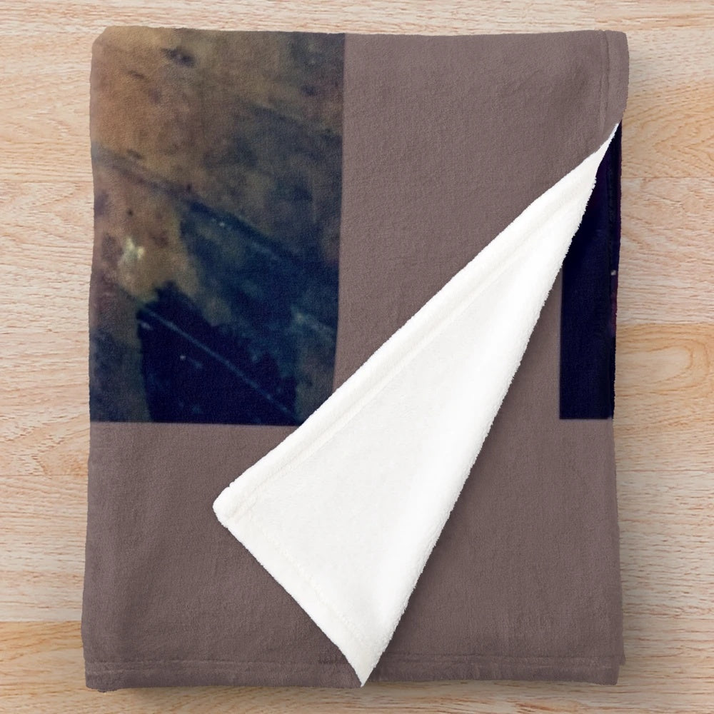 Vintage-inspired plush blanket featuring a design of antique cinema chairs
