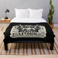 Vintage-inspired plush blanket featuring classic cinema ticket design
