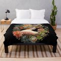 Vintage-inspired plush blanket featuring classic movie artwork