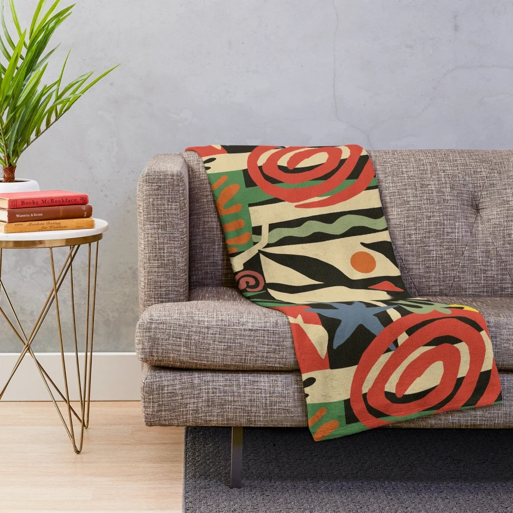 Vintage-inspired plush blanket with Matisse-inspired abstract design