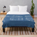 Plush blanket featuring a detailed blueprint design of the MGB GT sports car