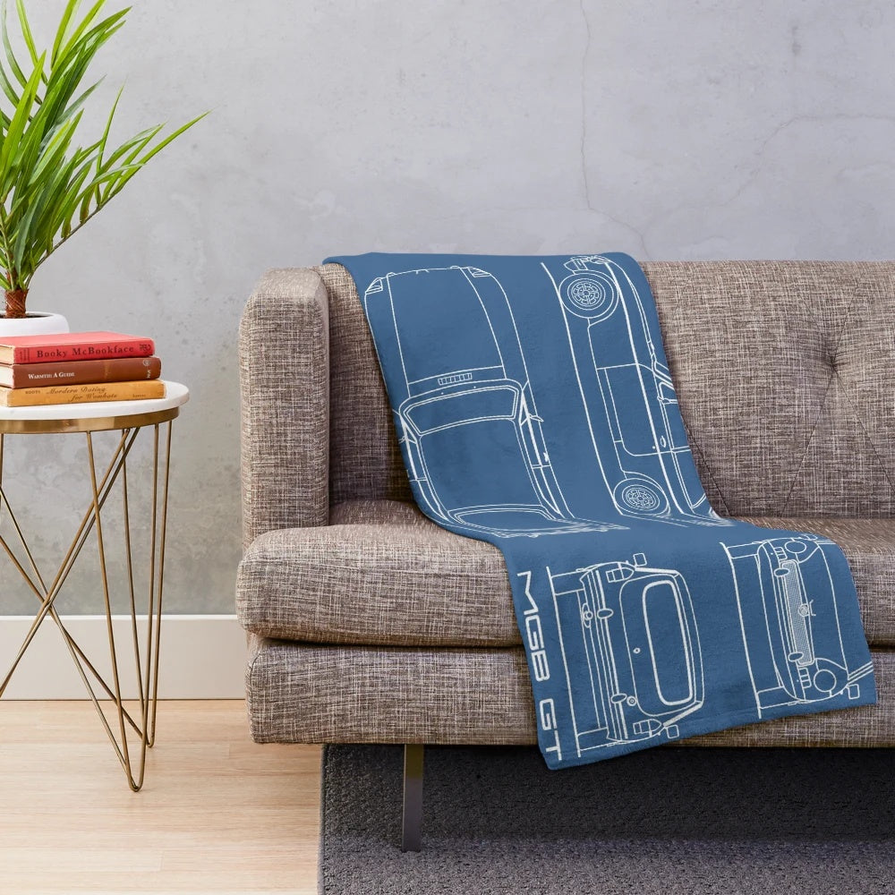 Plush blanket featuring a detailed blueprint design of the MGB GT sports car