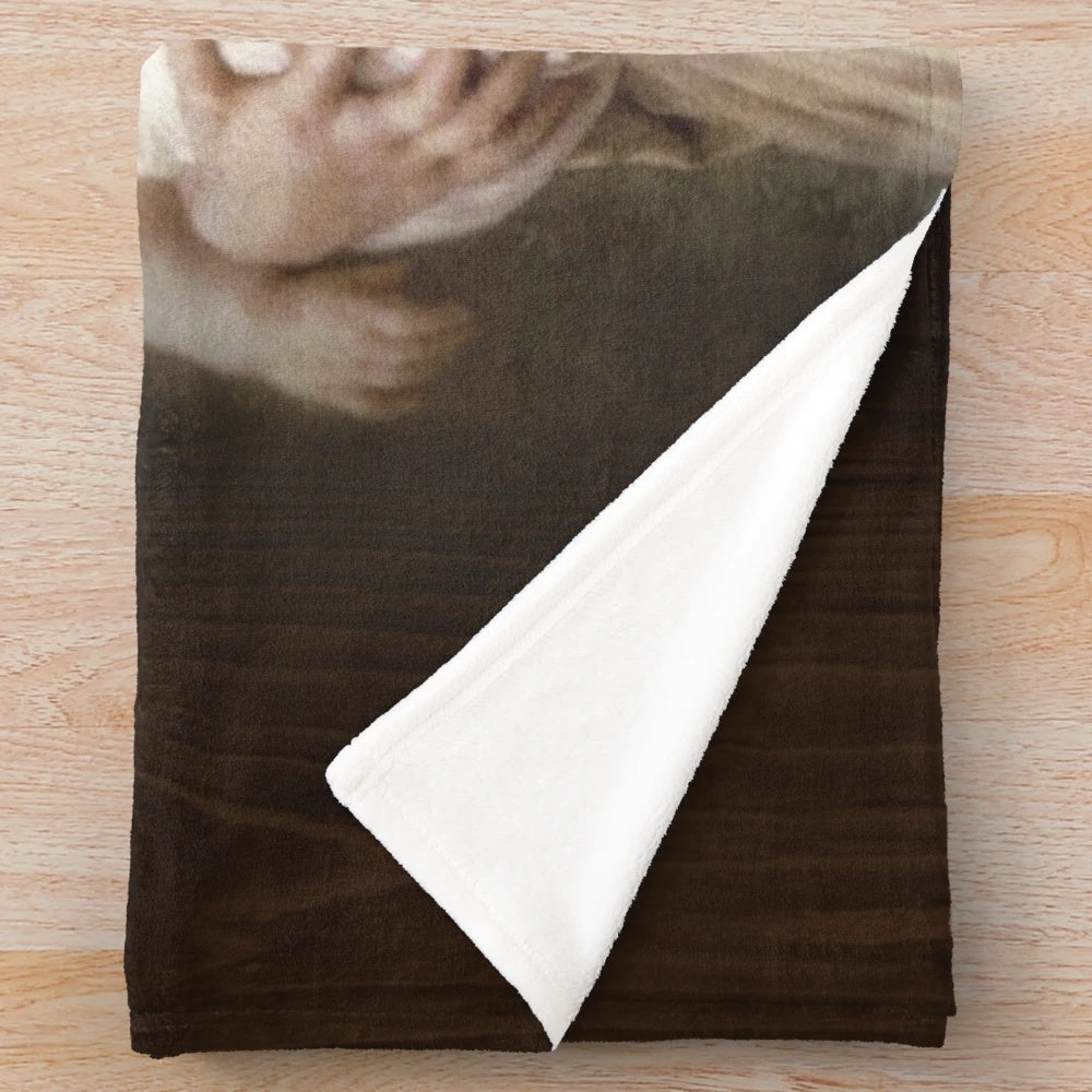 Plush blanket featuring a vintage inspired religious scene of the Virgin Mary holding baby Jesus and a lamb