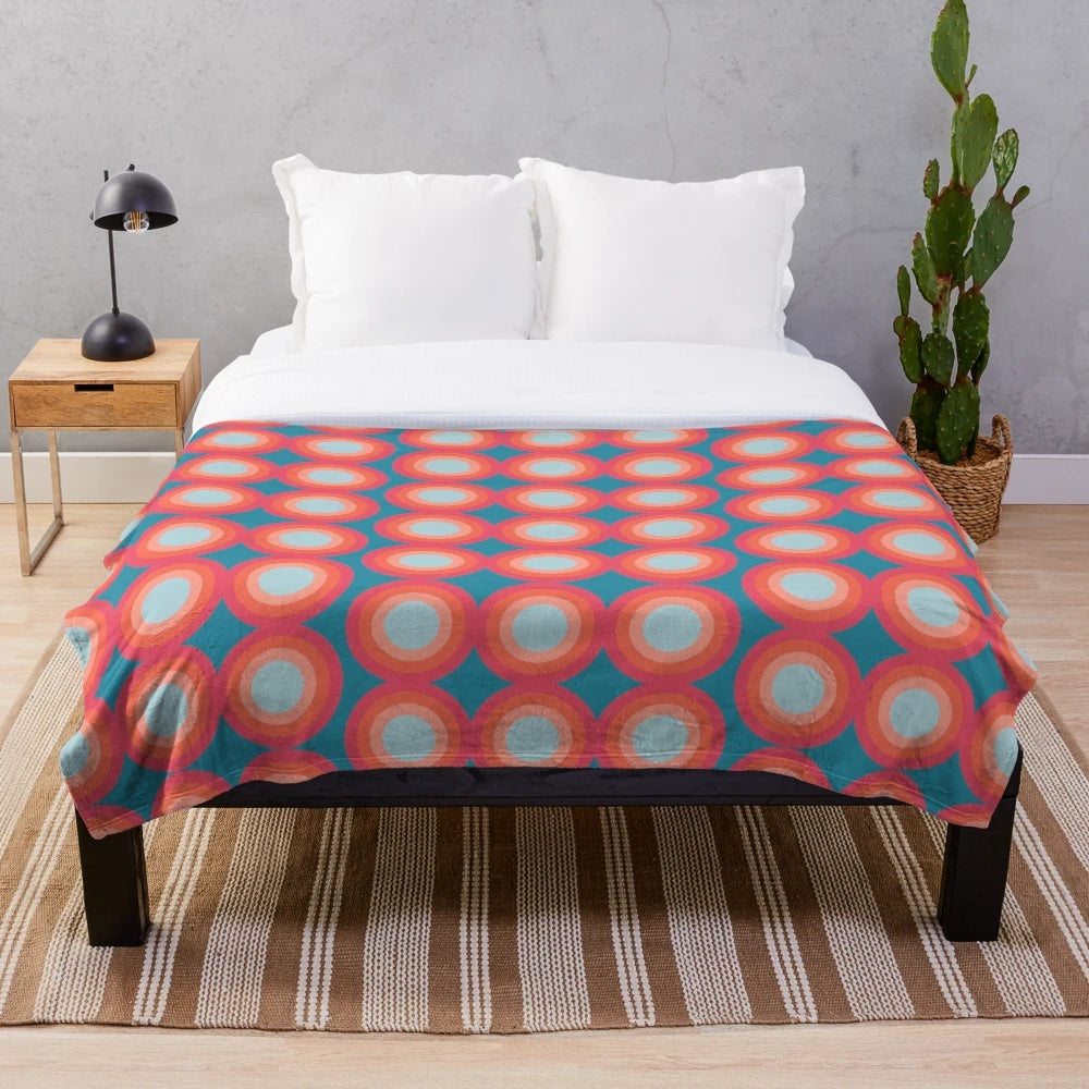 Vintage-inspired plush blanket featuring abstract art and retro patterns